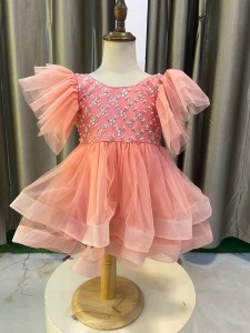 Peach Baby Frock with beaded cheat and fishnet